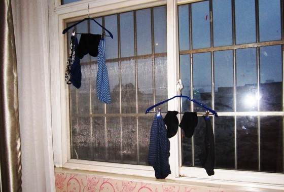 Nothing dried in this barred window against the rainy, grey skies of Kunming.