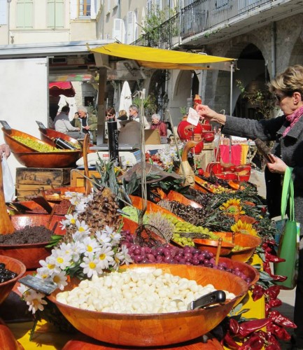 Snowy mountains loom over barren valleys awaiting the kiss of summer's sun to come alive.