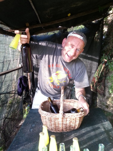 Gianpetro shows off his home made limoncello (good) and wine (not so good).