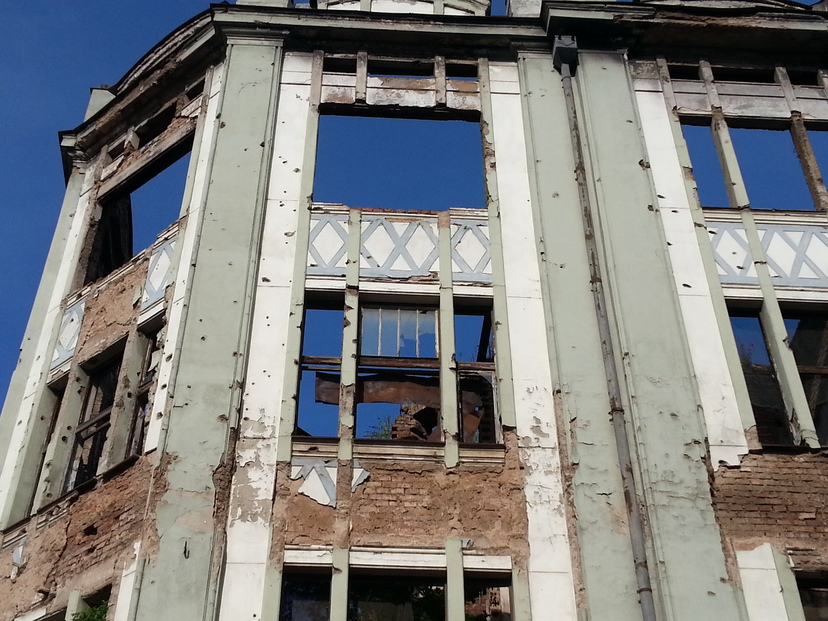One of the war-ravaged buildings left standing by the government as a reminder.