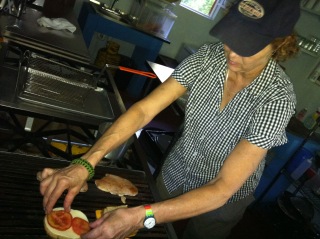 Cooking meals for guests at the lodge